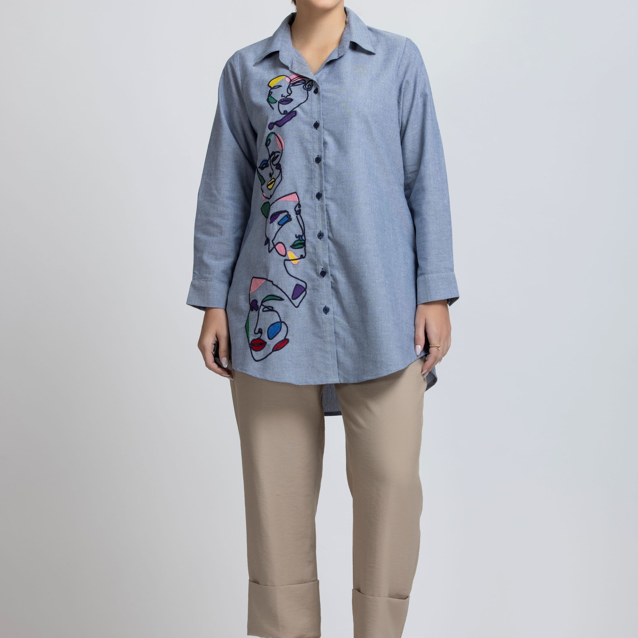 SOLID COLOR FRONT EMBROIDERED BUTTON-UP SHIRT.