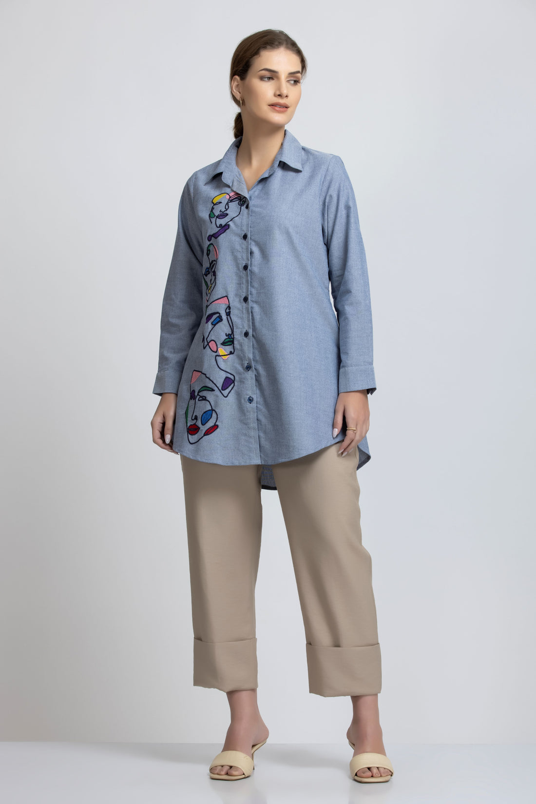 SOLID COLOR FRONT EMBROIDERED BUTTON-UP SHIRT.