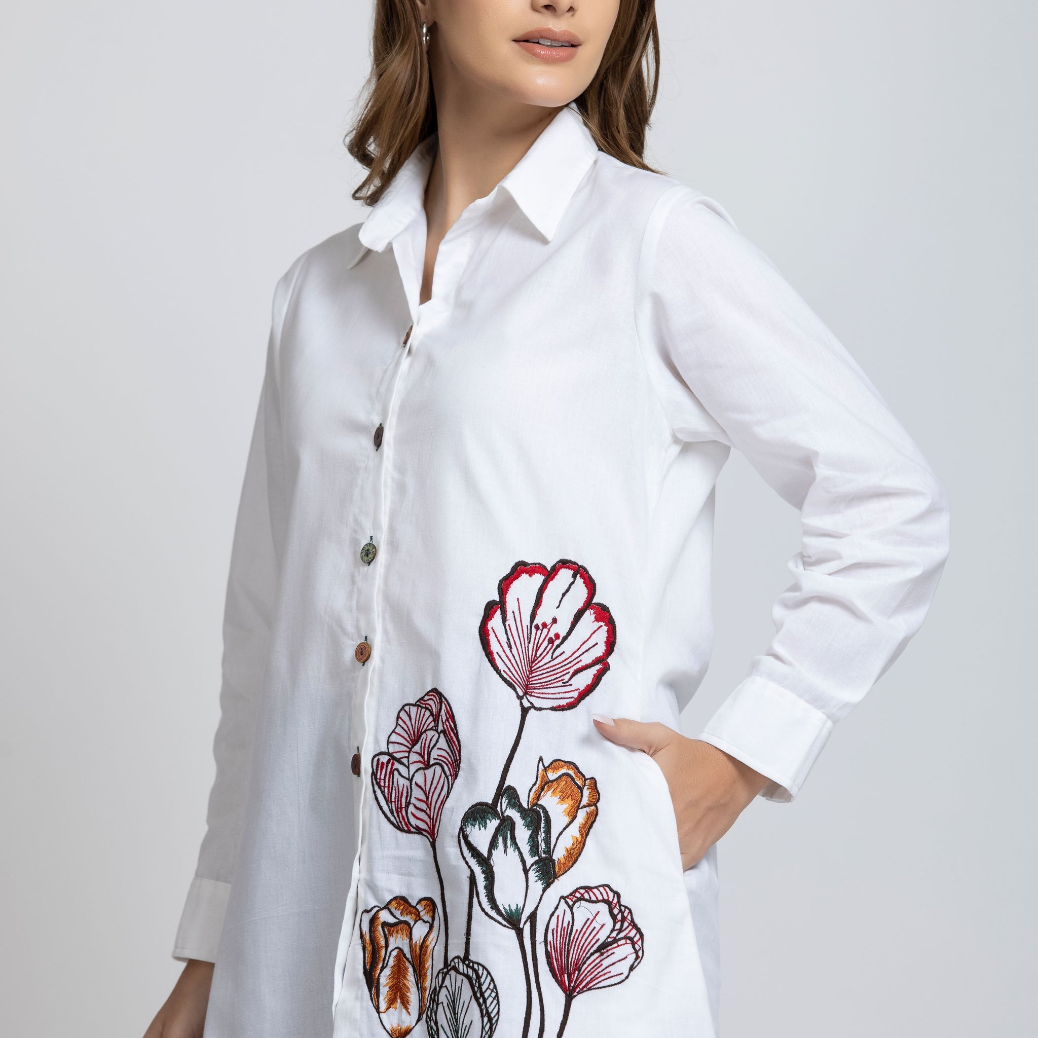 SOLID COLOR FRONT  EMBROIDERED BUTTON-UP SHIRT.